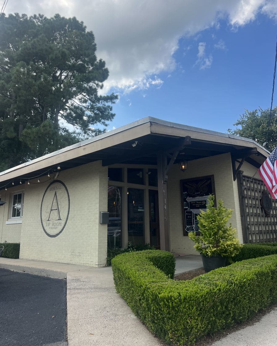 The front of Arsenal Tap Room with the circle A on the wall